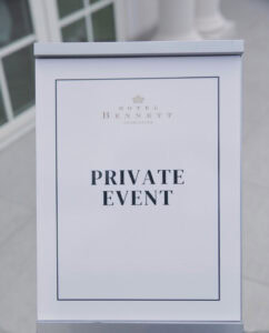 This is a picture of the sign of a private event at Hotel Bennett