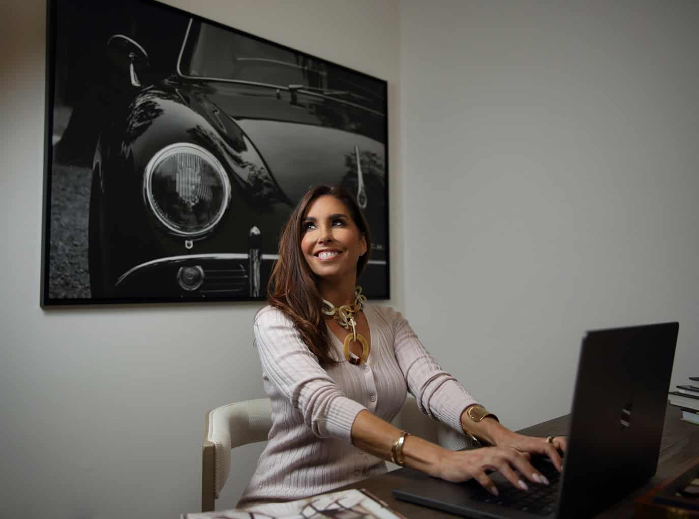 This branding photograph is carrie on a computer in a luxury home